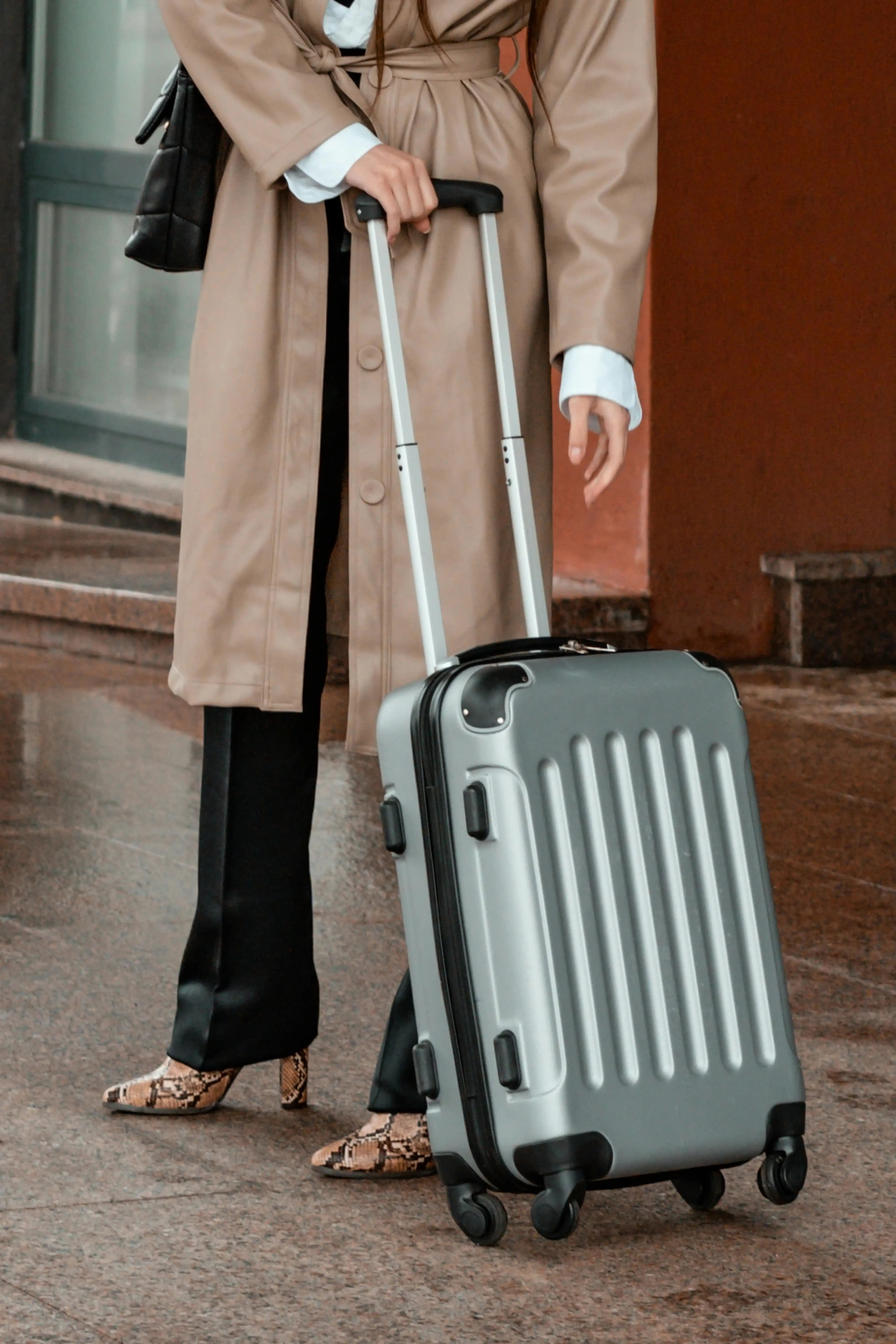 Luggage cart with suitcases at airport